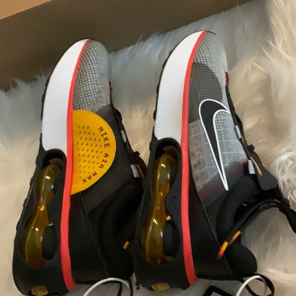 Nike Gray and Black Sneakers with Red and Yellow Accents - Picture 4 of 9